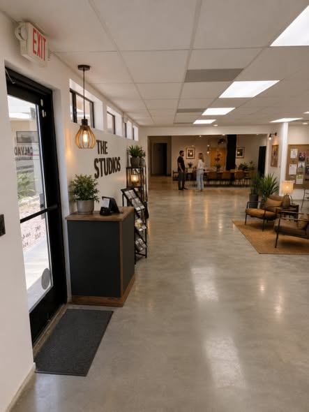 The front lobby of The Studios with seating and a welcome desk